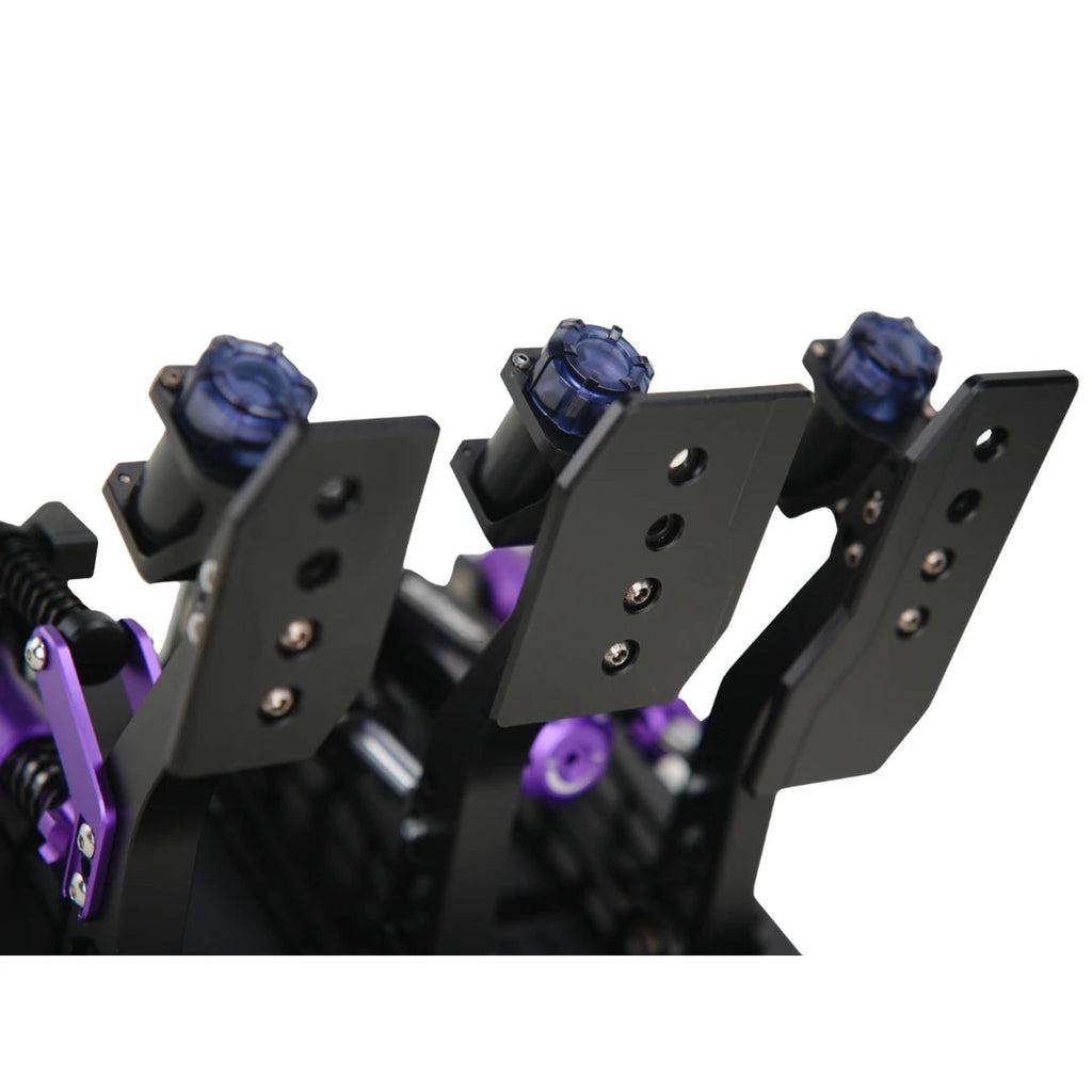 Conspit CPP Lite hydraulic 3 pedal set, close-up on pedal faces — blue haptic feedback motor caps